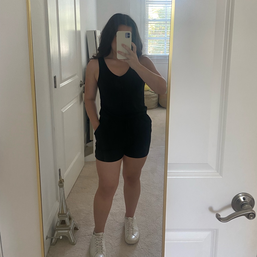 Black One Piece Romper With Built In Tie At The Waist That Ties In A Bow